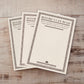 Three vintage-style notepads fanned out on a light wood background. The notepads are off-white with ornate dark borders and the title 'BEFORE I CAN READ' printed at the top.